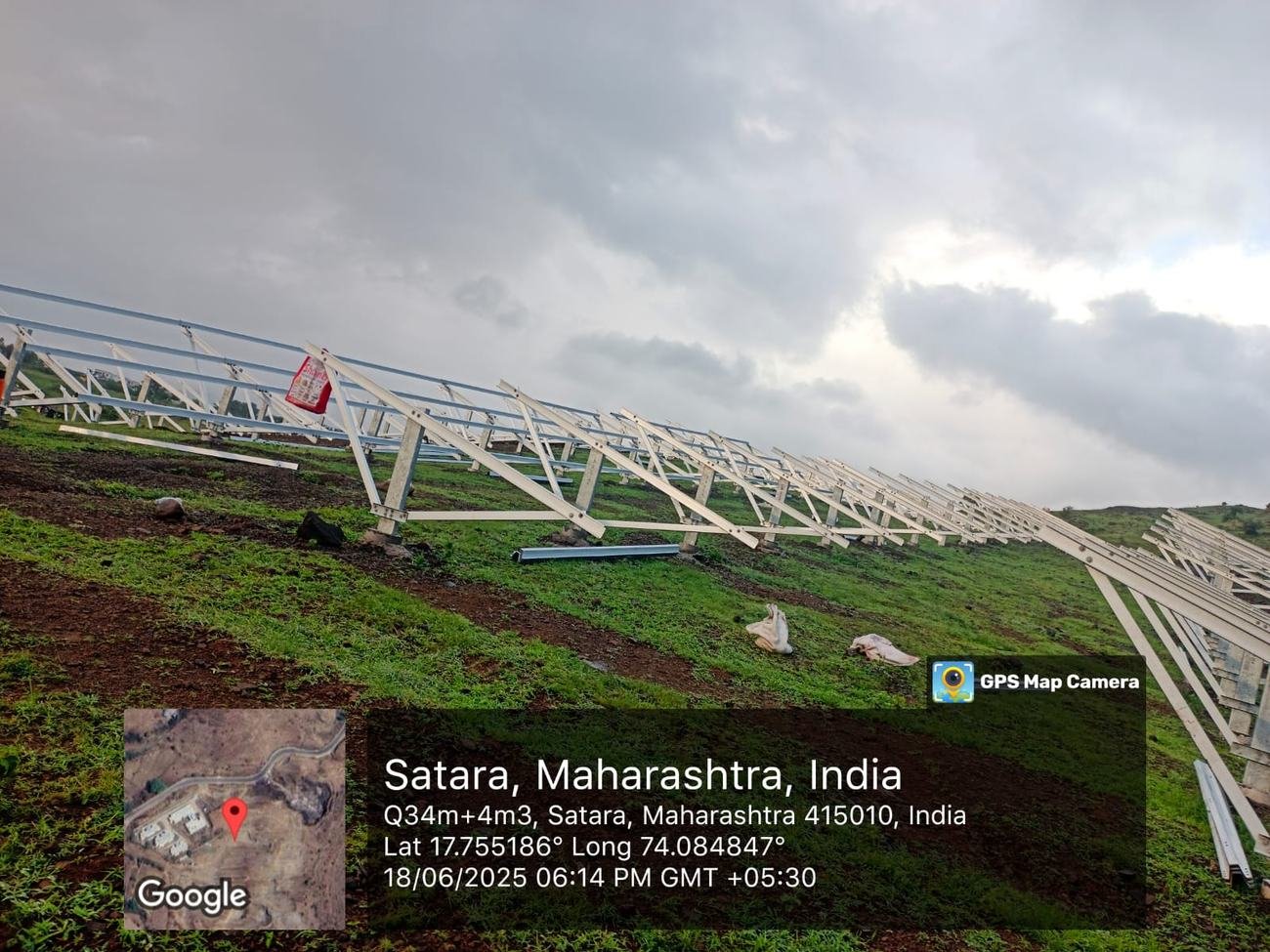 Solar panel rows at the Satara Megha Project solar farm